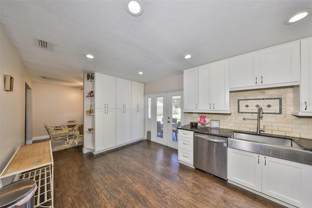 kitchen featuring french doors, dark wood finished floors, visible vents, a sink, and dishwasher