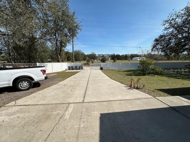 view of road featuring driveway