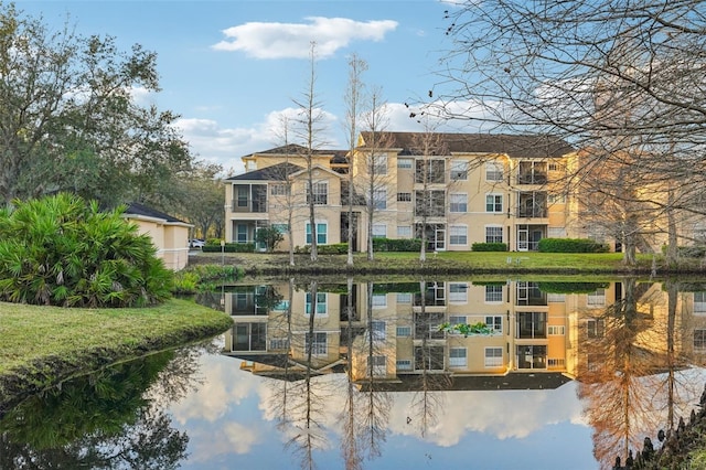 view of building exterior with a water view