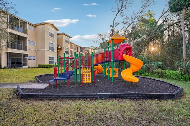 communal playground with a lawn