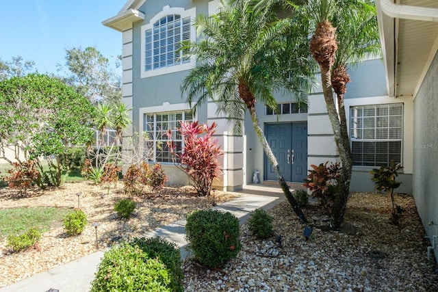 exterior space with stucco siding