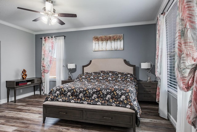 bedroom with baseboards, ceiling fan, dark wood-type flooring, and crown molding