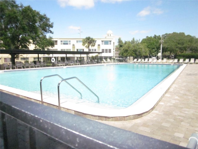 pool with a patio