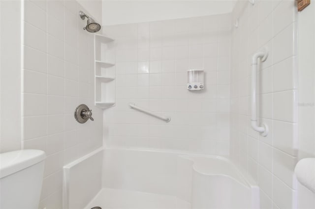 full bathroom with toilet and walk in shower