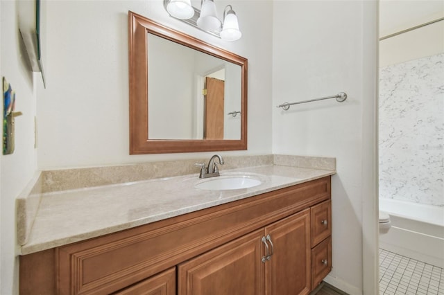 full bath with toilet, tile patterned flooring, and vanity