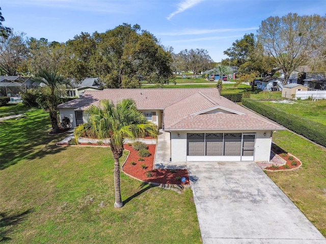 single story home with roof with shingles, driveway, a front lawn, and stucco siding