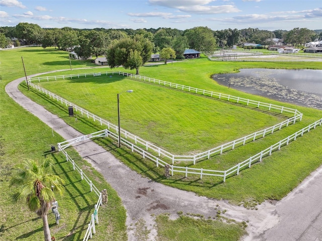 bird's eye view featuring a rural view and a water view