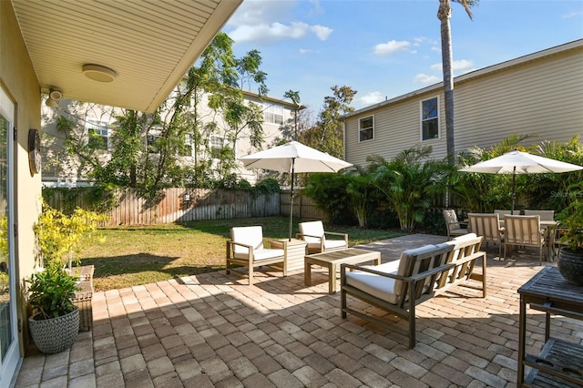 view of patio / terrace with outdoor dining space and a fenced backyard