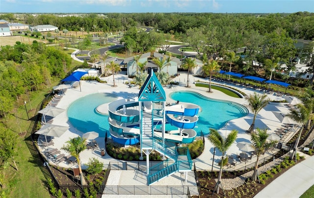 10410 Cross River Trl, Parrish, FL 34219 - bird's eye view of a pool and a heavily wooded area
