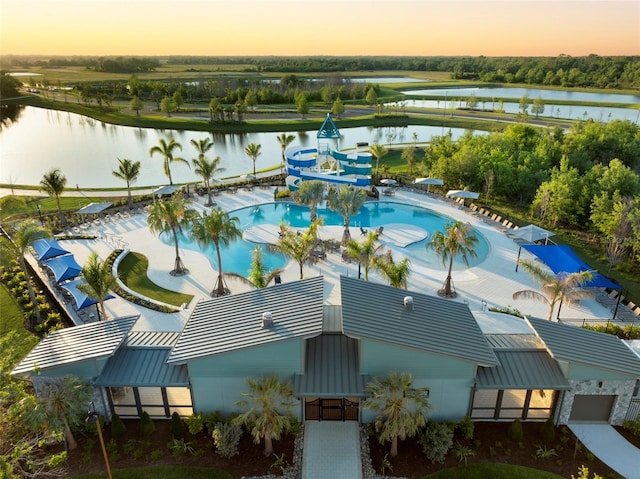 10410 Cross River Trl, Parrish, FL 34219 - aerial view at dusk of a water view and view of pool area