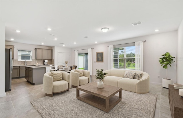 10410 Cross River Trl, Parrish, FL 34219 - living room featuring healthy amount of natural light and recessed lighting