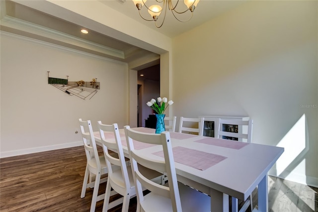 dining area featuring baseboards, ornamental molding, dark wood-style flooring, a chandelier, and recessed lighting