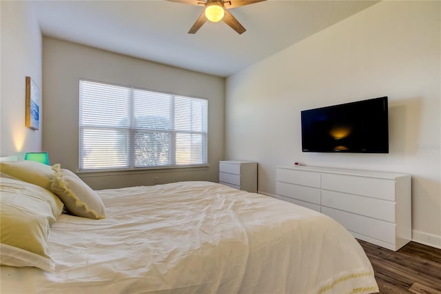 bedroom featuring ceiling fan and dark wood finished floors