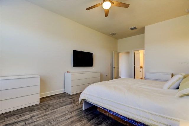 bedroom featuring a ceiling fan, dark wood-style flooring, visible vents, and baseboards