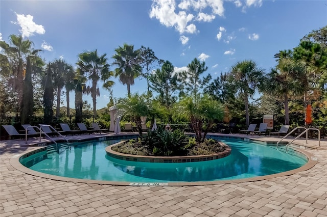 pool featuring a patio