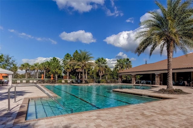 pool featuring a patio area