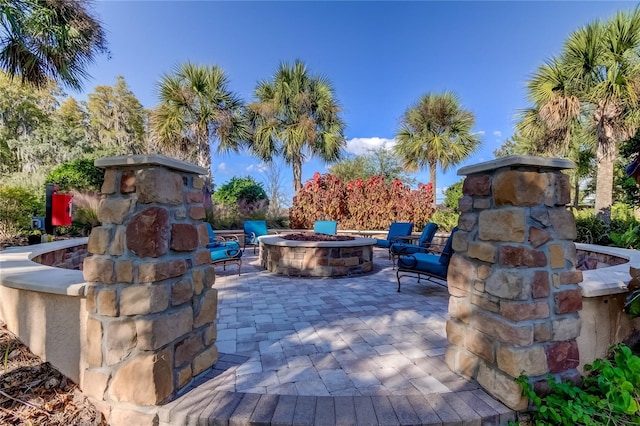 view of patio featuring a fire pit