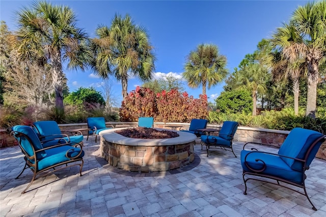 view of patio / terrace with an outdoor fire pit