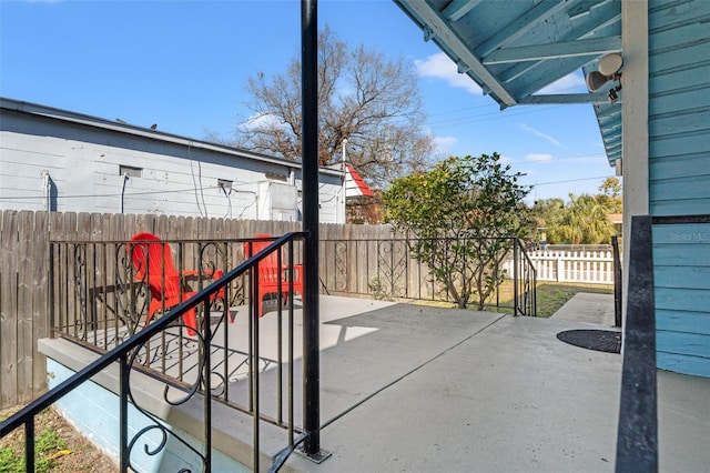 view of patio with a fenced backyard