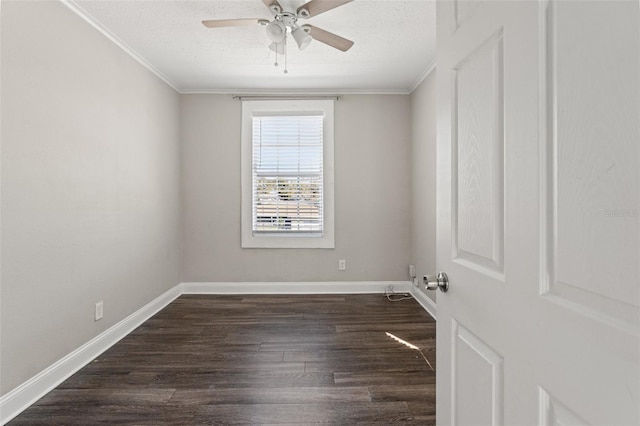 unfurnished room featuring dark wood-style flooring, a textured ceiling, and baseboards