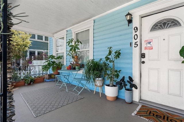 entrance to property with covered porch