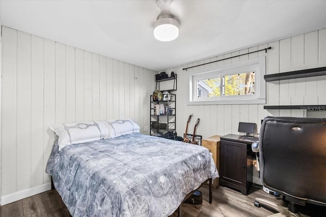 bedroom featuring wood finished floors