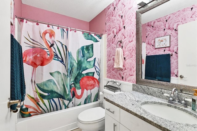 full bath featuring toilet, shower / bath combo with shower curtain, a textured ceiling, and vanity