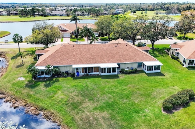 bird's eye view with a water view and a residential view