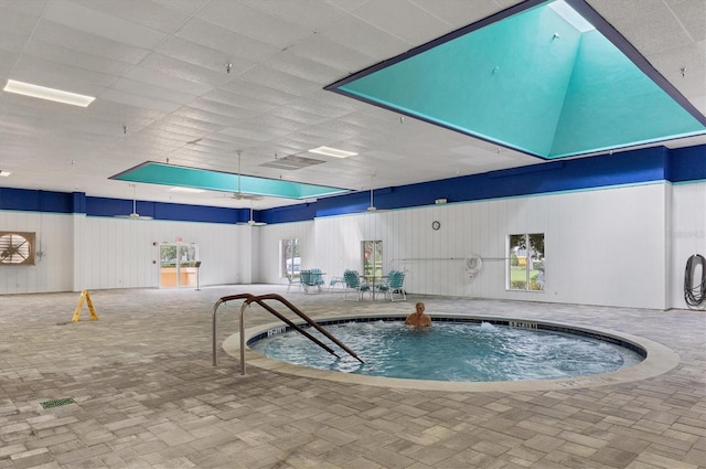 view of pool featuring a swimming pool and an indoor in ground hot tub