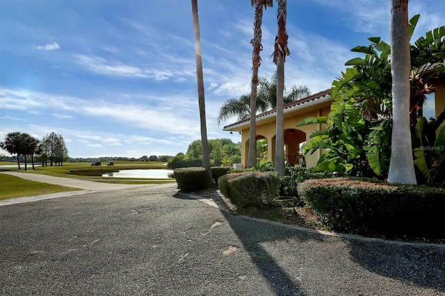 exterior space with a water view