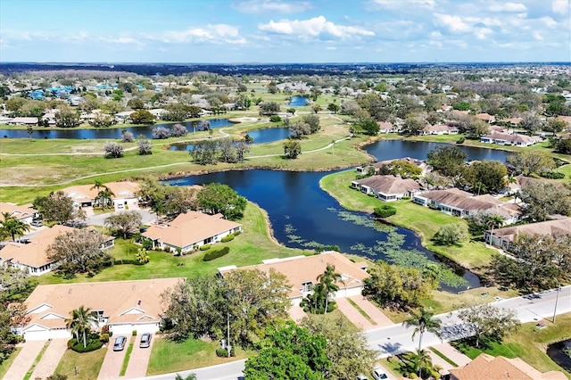 bird's eye view featuring a water view and a residential view