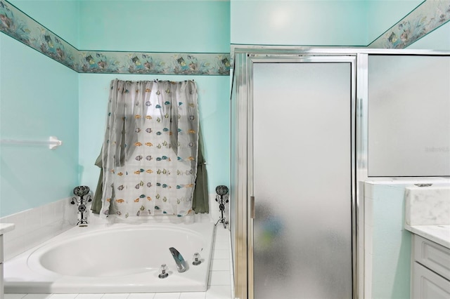 full bath featuring a stall shower, vanity, and a bath