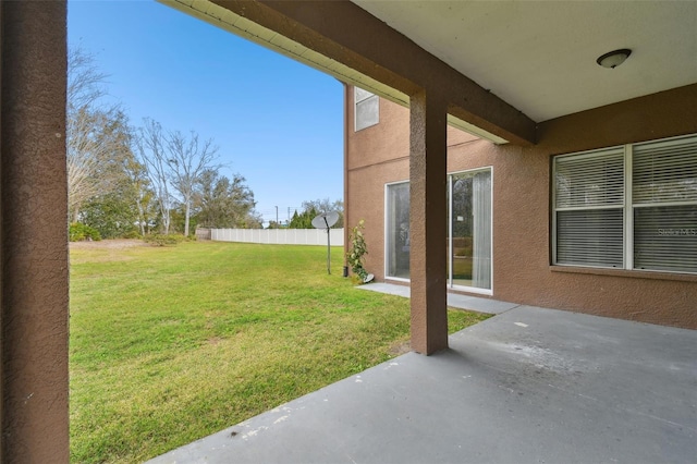 view of yard featuring a patio area and fence