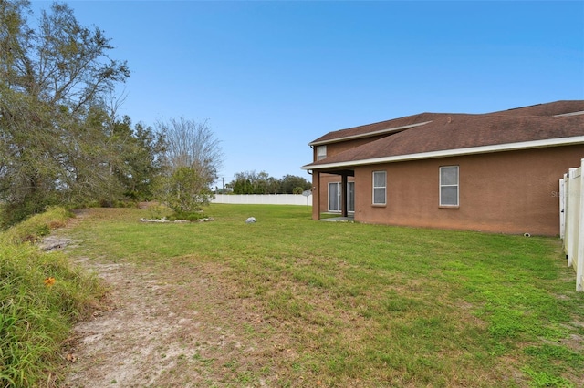 view of yard featuring fence