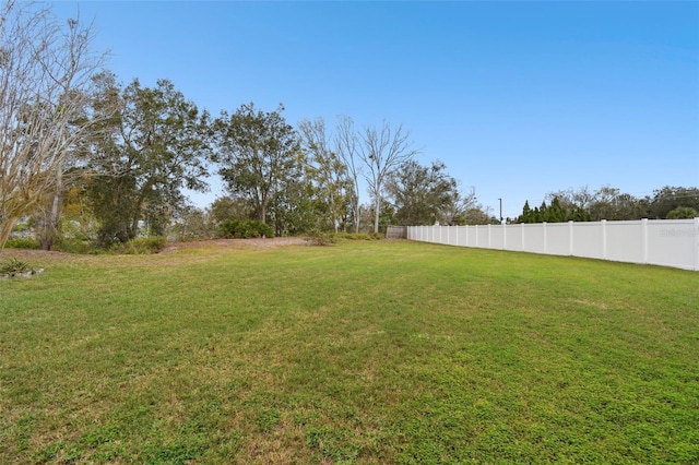 view of yard with fence