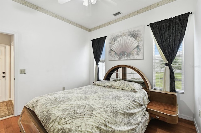 3613 Pendleton Way, Land O Lakes, FL 34639 - bedroom with wood finished floors and a ceiling fan