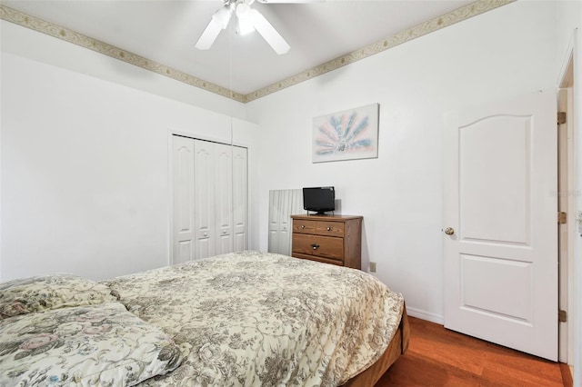 3613 Pendleton Way, Land O Lakes, FL 34639 - bedroom with wood finished floors, a closet, and ceiling fan
