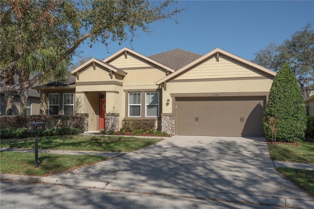 craftsman-style house with driveway, stone siding, an attached garage, and stucco siding