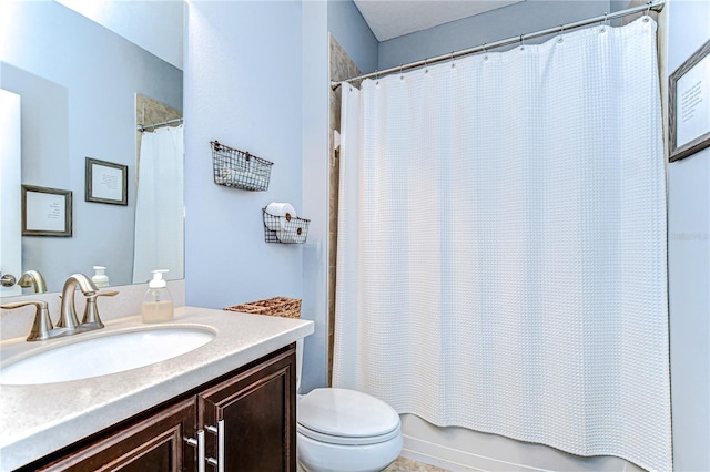 bathroom with shower / bath combo with shower curtain, vanity, and toilet