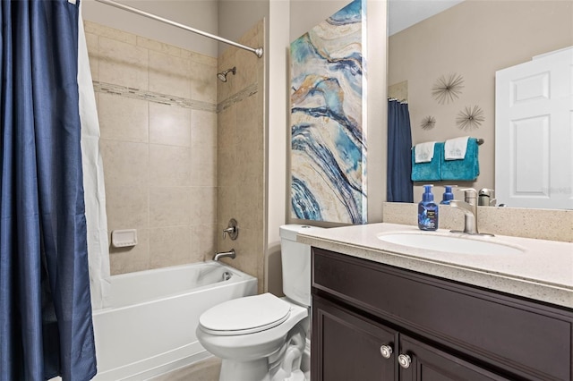 full bathroom featuring vanity, shower / bath combination with curtain, and toilet