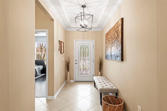 entryway featuring a wealth of natural light, crown molding, and light tile patterned floors