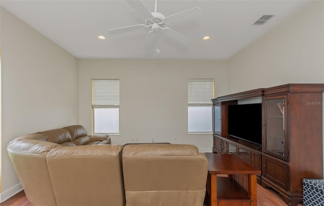 living room featuring recessed lighting, visible vents, ceiling fan, wood finished floors, and baseboards