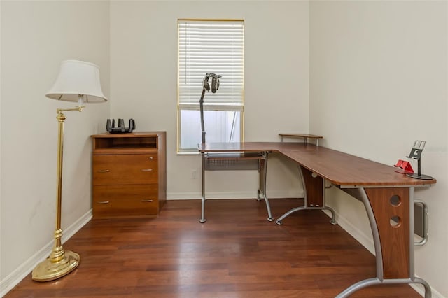 office area featuring dark wood-style floors and baseboards