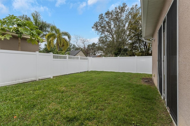 view of yard featuring a fenced backyard