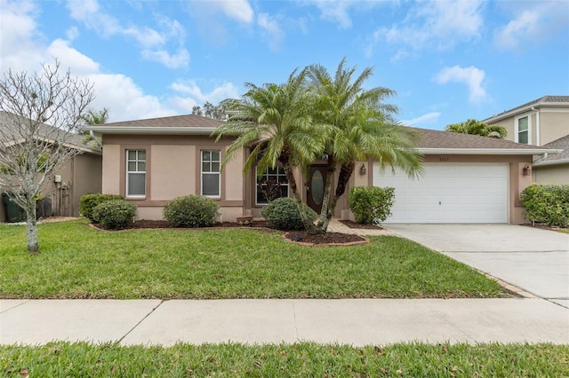 ranch-style home with a garage, driveway, a front lawn, and stucco siding