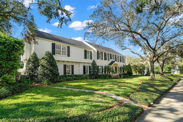 view of front of home with a front lawn