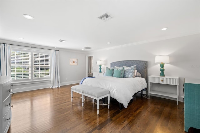 bedroom with recessed lighting, visible vents, ornamental molding, wood finished floors, and baseboards