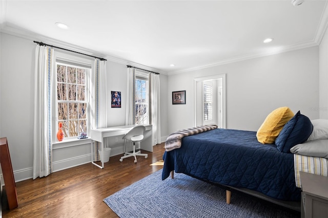 bedroom with baseboards, ornamental molding, wood finished floors, and recessed lighting