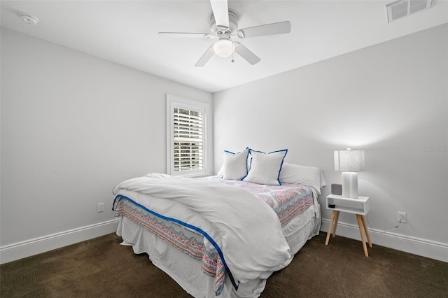 bedroom with baseboards, visible vents, ceiling fan, and carpet flooring