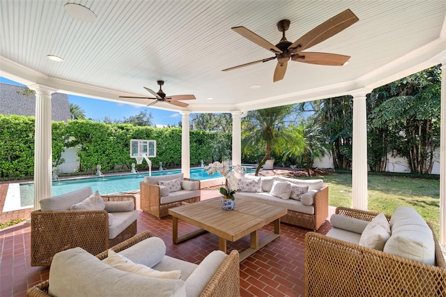 view of patio / terrace featuring an outdoor pool, a fenced backyard, an outdoor living space, and a ceiling fan